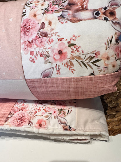 Ready to go, lightly quilted style blanket with pink and yellow floral deer print. Soft ivory minky backing