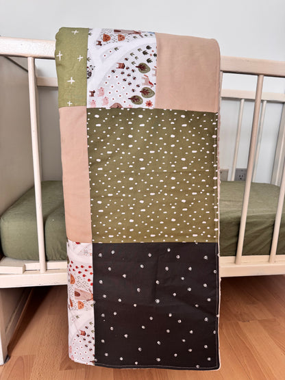 Ready to go, lightly quilted style blanket, green and beige forest animals. Soft green minky backing