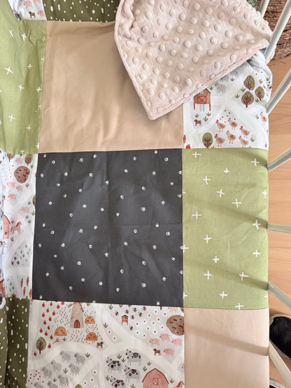 Ready to go, lightly quilted style blanket, green and beige forest animals. Soft green minky backing