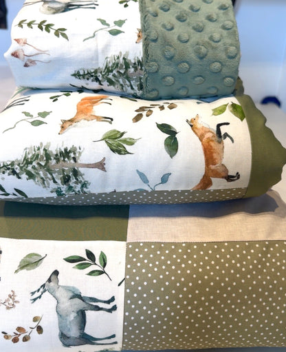 Ready to go, lightly quilted style blanket, green and beige forest animals. Soft green minky backing